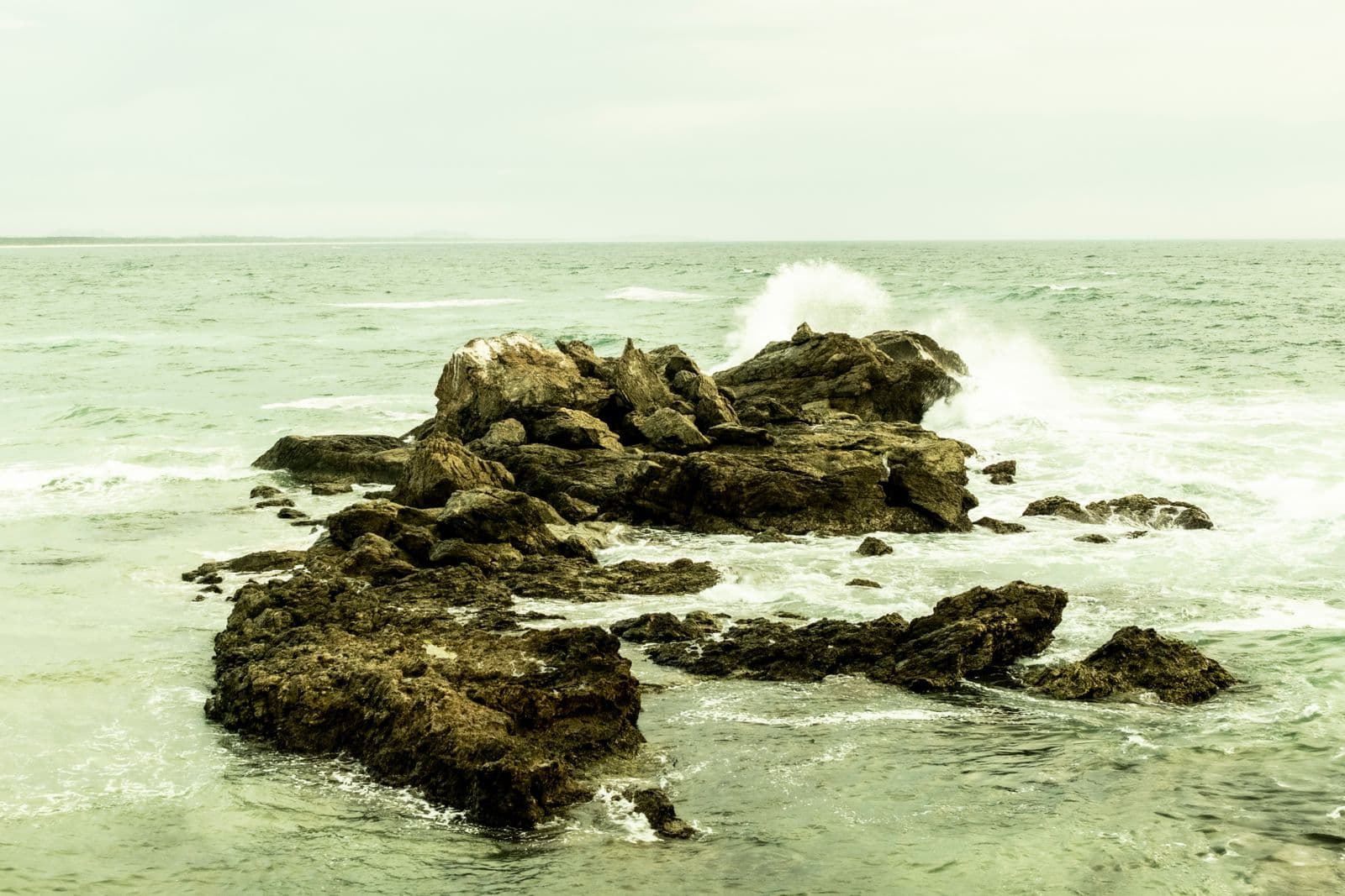 Waves washing over rocks on the Port Macquarie shoreline