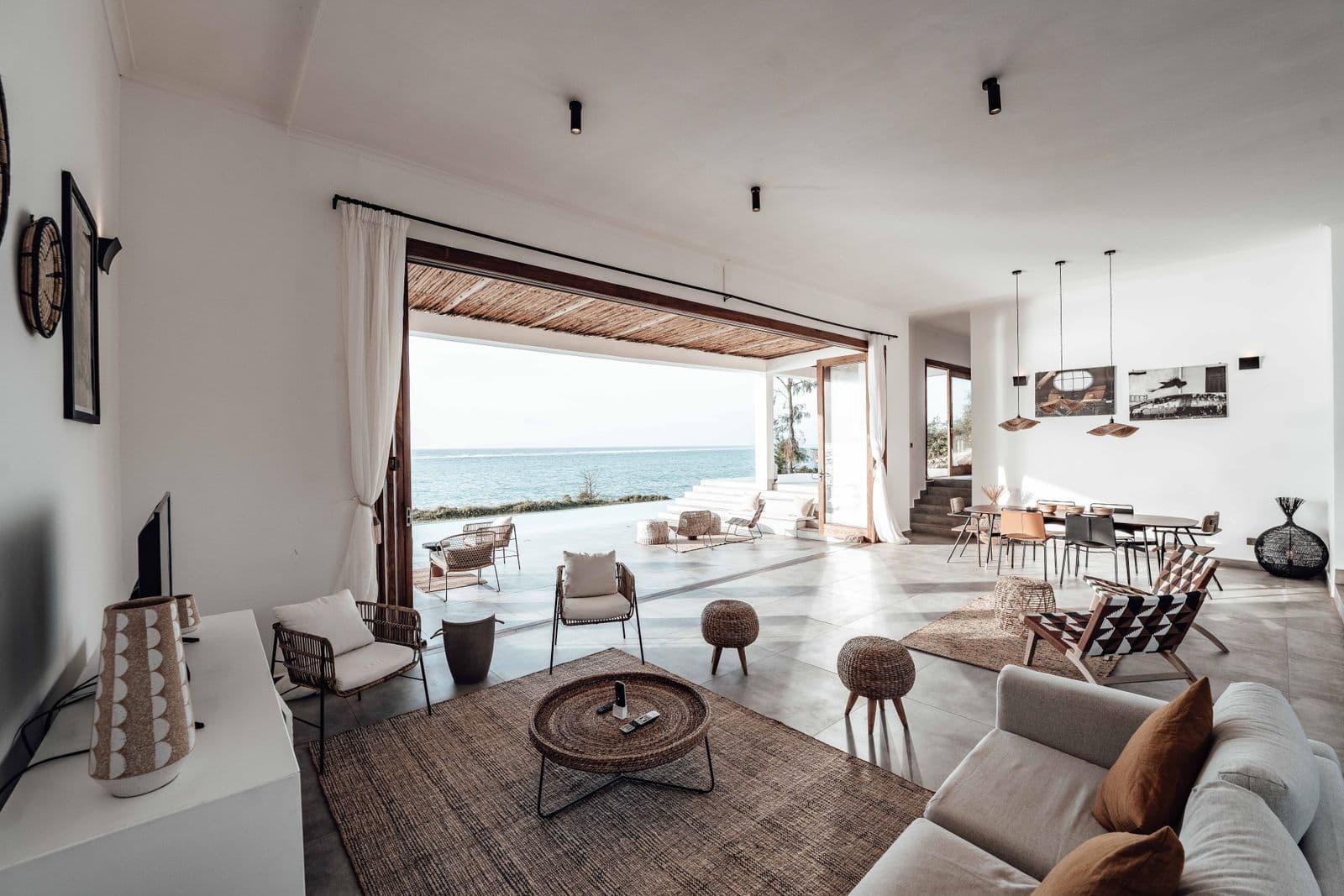 A light-filled living room looking out to the sea